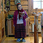 Skolt Sami woman in church.jpg